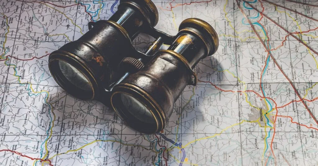 Close-up of antique binoculars placed on a detailed map, evoking adventure.