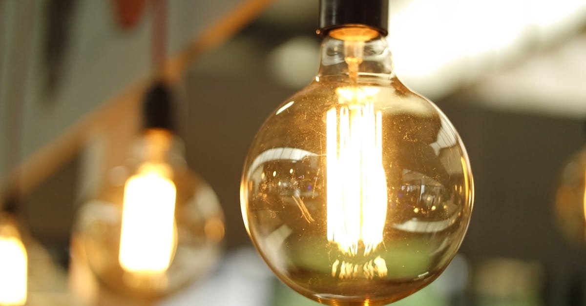 A close-up of a glowing vintage Edison bulb creating a warm atmosphere.