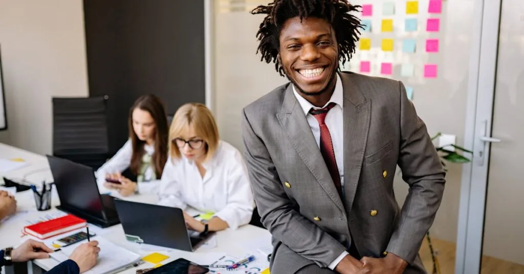 Happy colleagues working together in a modern office setting, showcasing diversity.