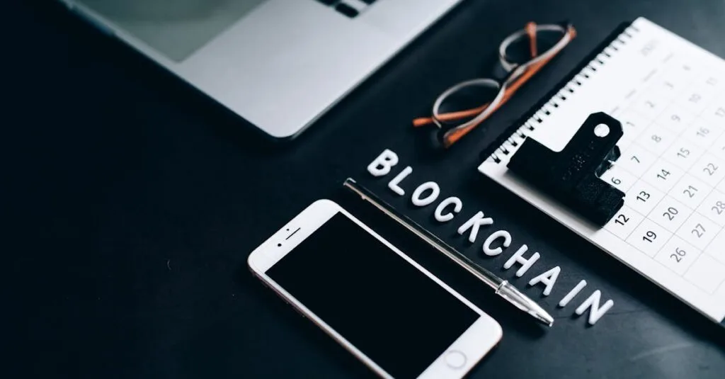 Flat lay of a modern digital workspace with blockchain theme, featuring a smartphone and calendar.