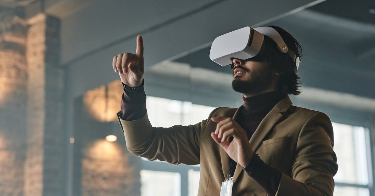 Businessman engaging with virtual reality technology indoors, pointing finger.