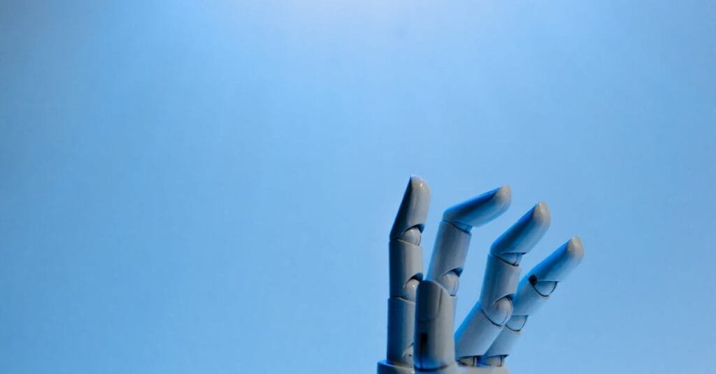 Robotic hand with articulated fingers reaching towards the sky on a blue background.