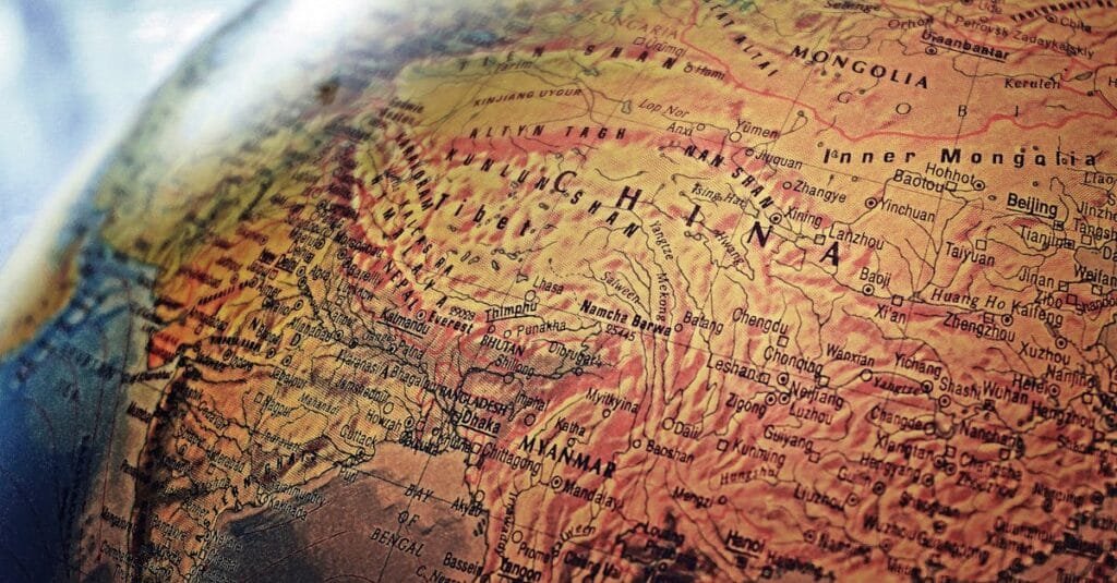 Explore the intricate details of China and neighboring regions in this vintage-style globe photo.