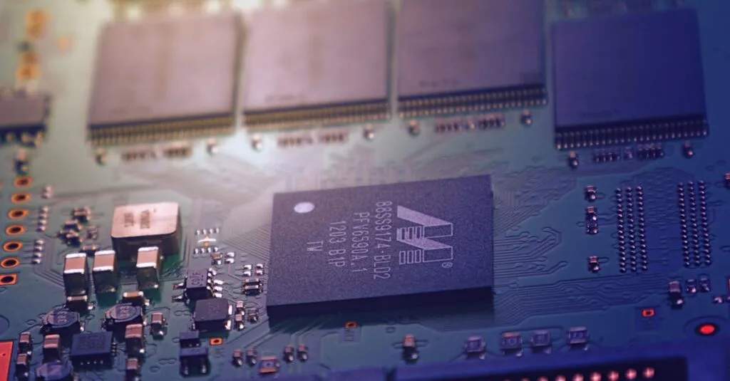 Detailed image of an electronic circuit board showing microchips and intricate wiring in a modern technological setting.