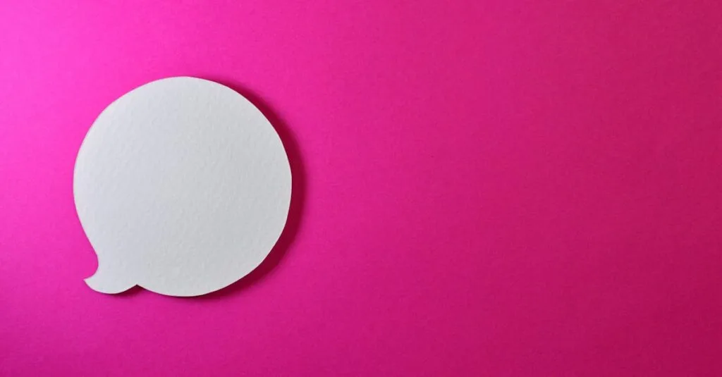Minimalist pink background with a white speech bubble for creative design projects.