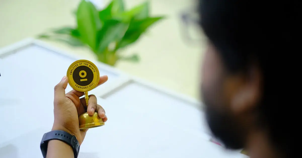Man proudly holding an Employee of the Month trophy, showcasing achievement and recognition.
