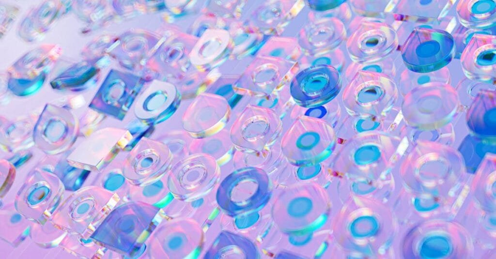 Vibrant abstract 3D render featuring transparent glass shapes with a holographic effect.
