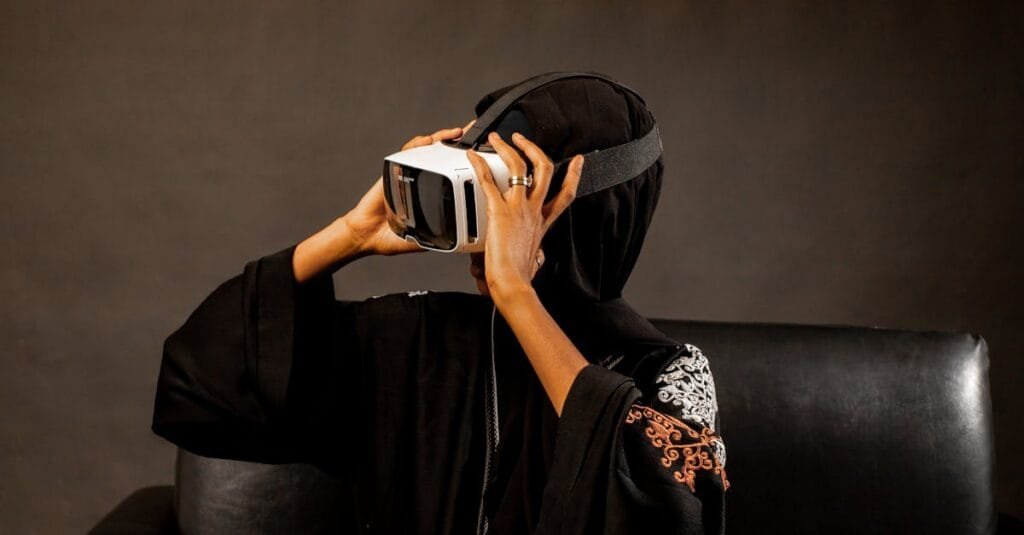 A woman in traditional dress immersed in virtual reality with VR headset indoors.