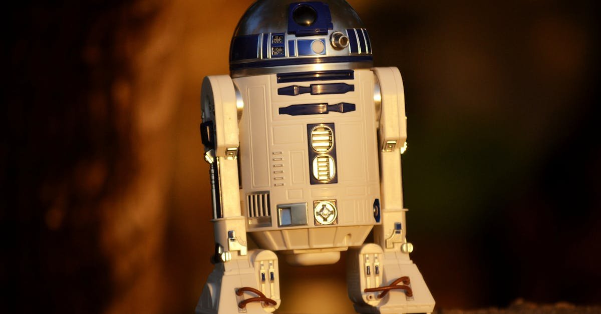 Close-up of a futuristic robot toy outdoors, showcasing its metallic and plastic components.