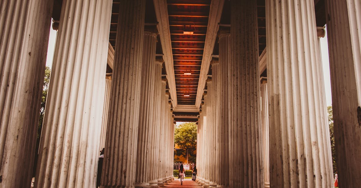 Dramatic view of ancient pillars at a famous landmark in Kolkata, India.