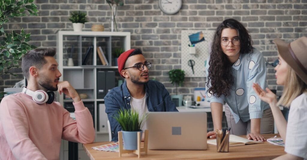 Young professionals collaborating in a stylish office environment.