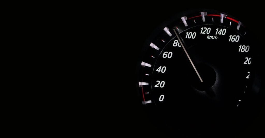 Speedometer reading showing speed in km/h on a dark background.