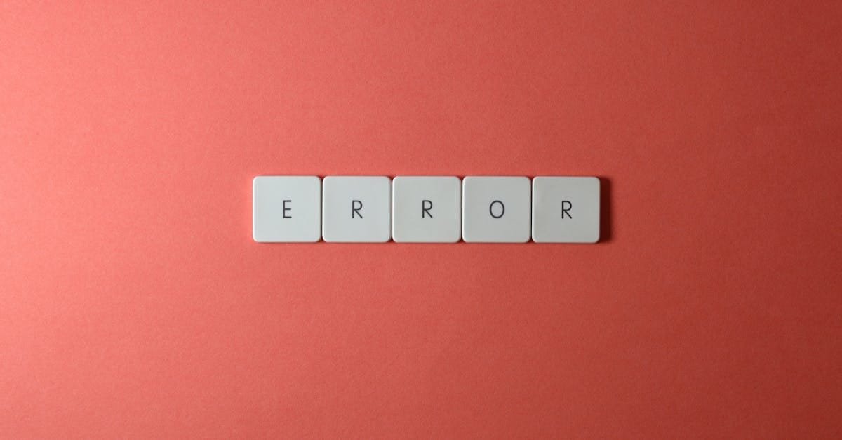 White letter tiles spelling 'ERROR' on a red backdrop, offering a minimalist design concept.