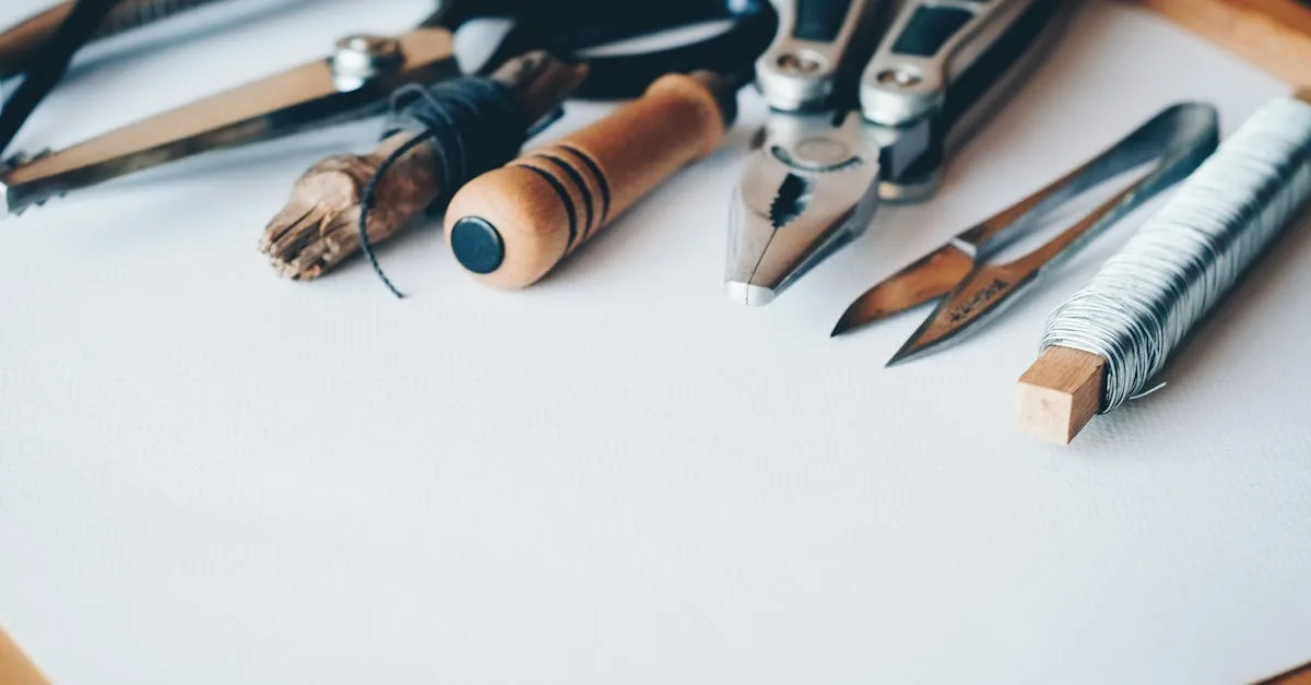 A selection of artisan tools and handmade crafts displayed on a white desk, perfect for creative projects.