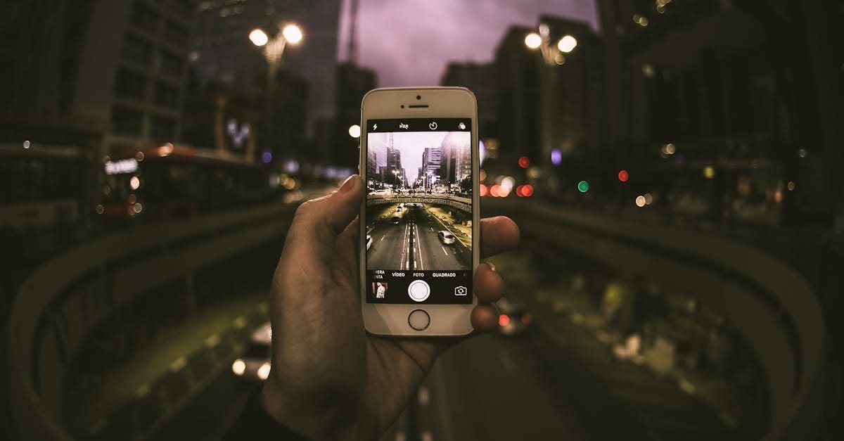 A dynamic cityscape captured through a smartphone, showcasing urban life at dusk.