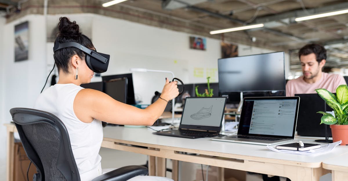 Woman using virtual reality headset in a modern office for design and innovation.