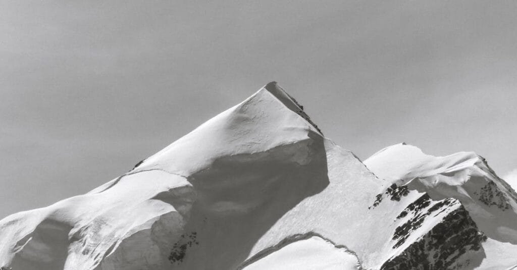 Majestic snow-covered peak in Canterbury, New Zealand, capturing winter's serene beauty.