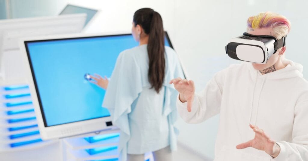 Two young adults engaging with VR and touchscreen technology in a futuristic room.