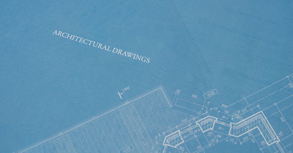 Close-up view of architectural blueprint with technical drawings.