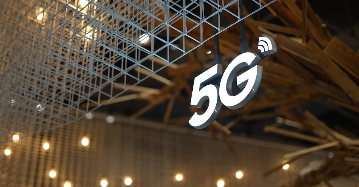 Illuminated 5G sign with modern geometric ceiling and warm lighting.