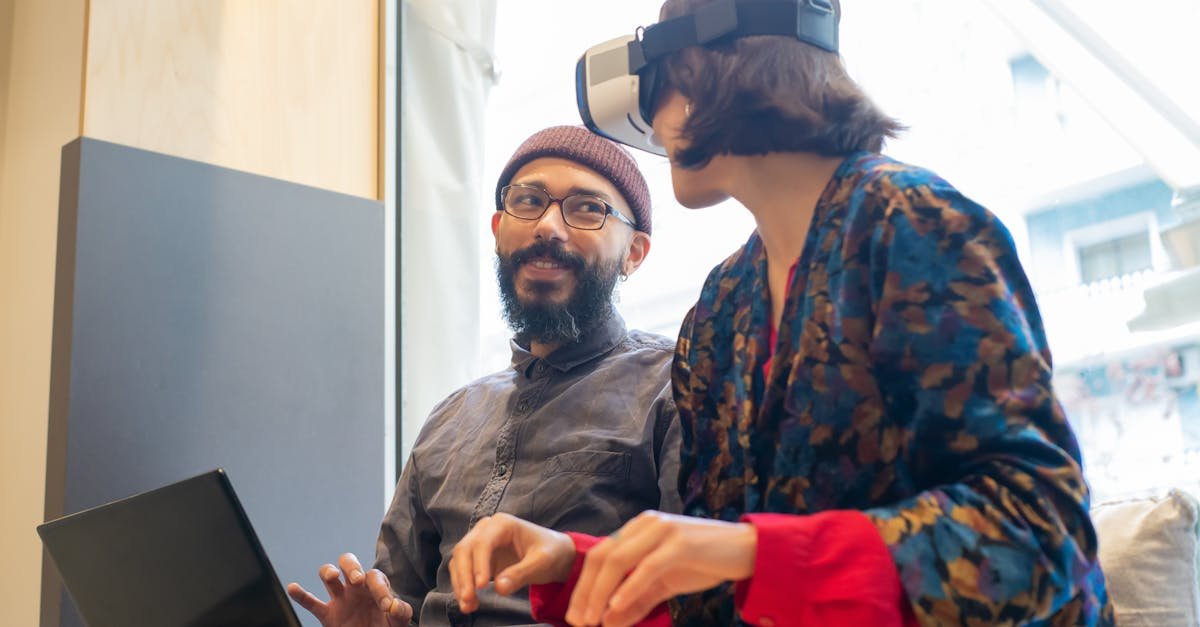 People enjoying virtual reality with a headset indoors, fostering tech-driven interaction.
