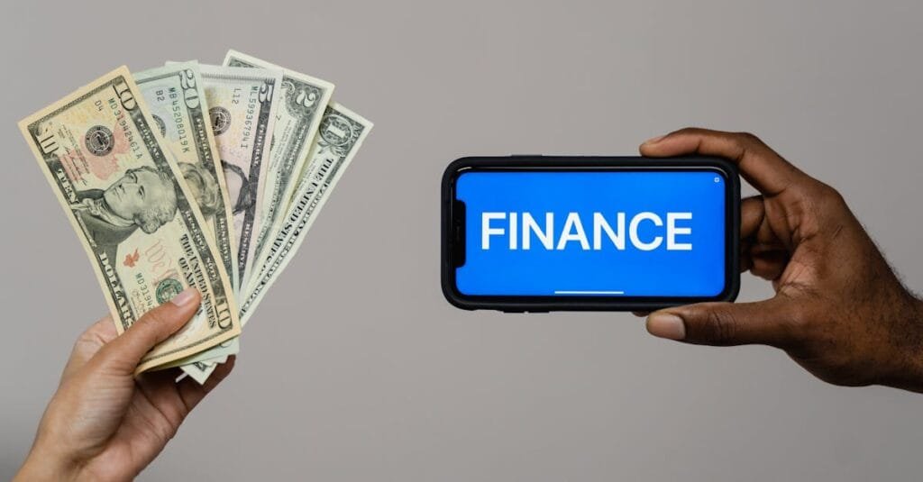 Image depicting currency and finance concept with hands holding cash and a smartphone.