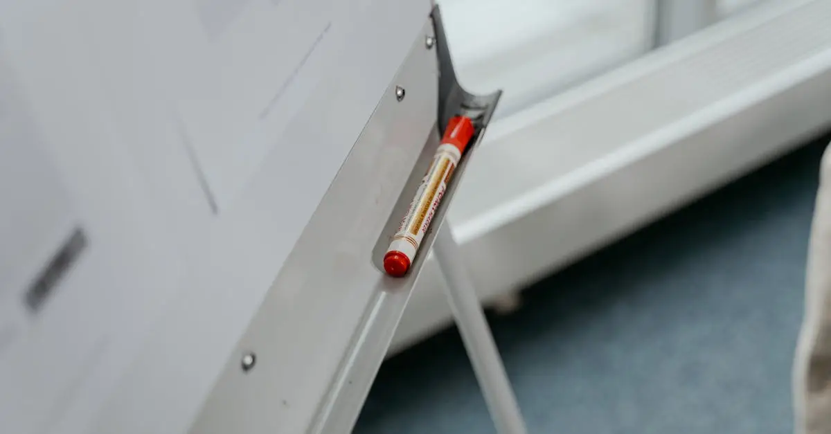 A whiteboard with a red marker resting on the tray, captured in a modern office setting.