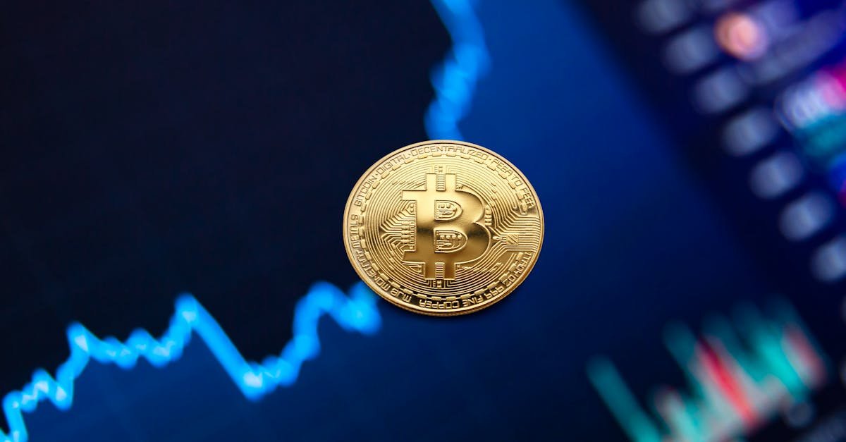 A gold Bitcoin coin against a backdrop of a digital financial chart, symbolizing cryptocurrency trading.