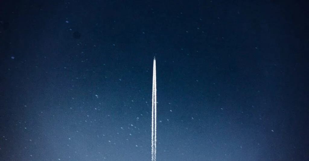 A rocket streaks through a starry night, leaving a trail in outer space.