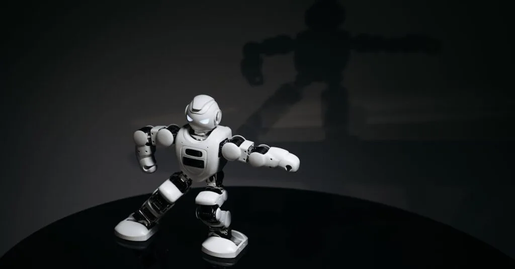 A futuristic white toy robot striking a pose in a dimly lit studio with a shadow cast behind it.