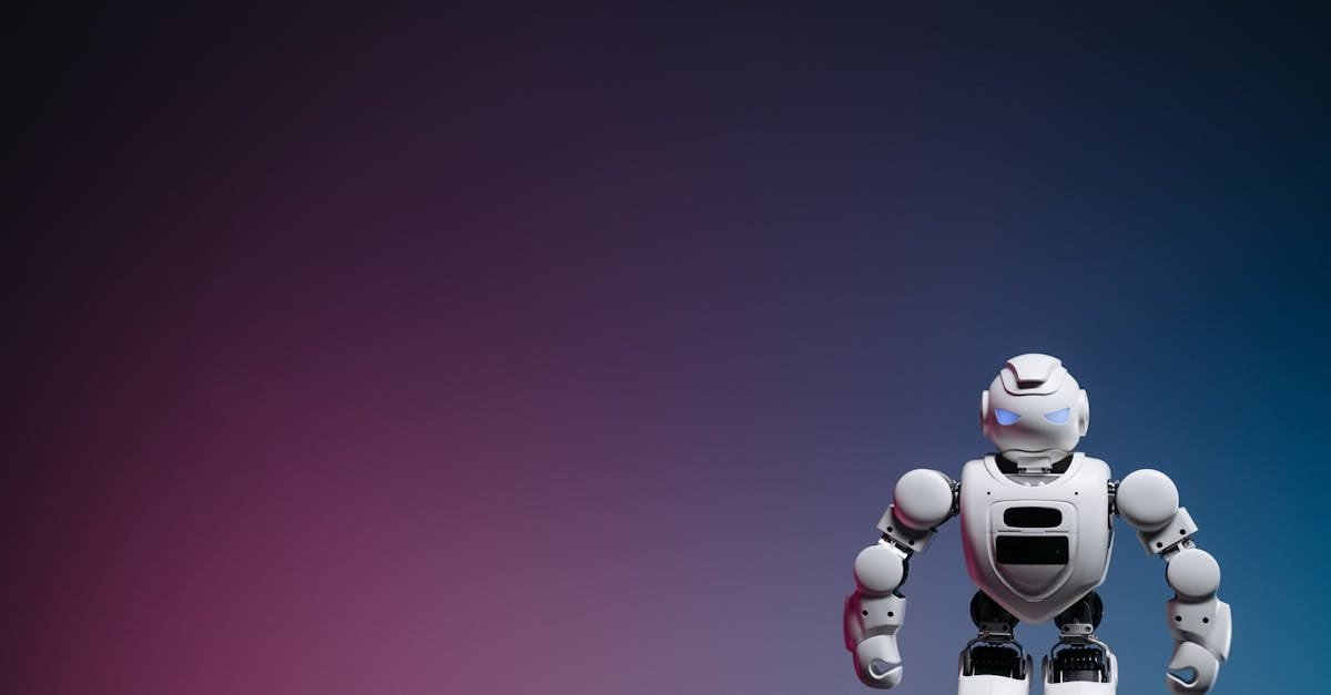 A sleek modern robot toy standing against a colorful gradient backdrop, offering ample copy space.