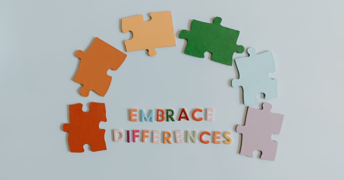 Colorful puzzle pieces and slogan embracing diversity on a white background.