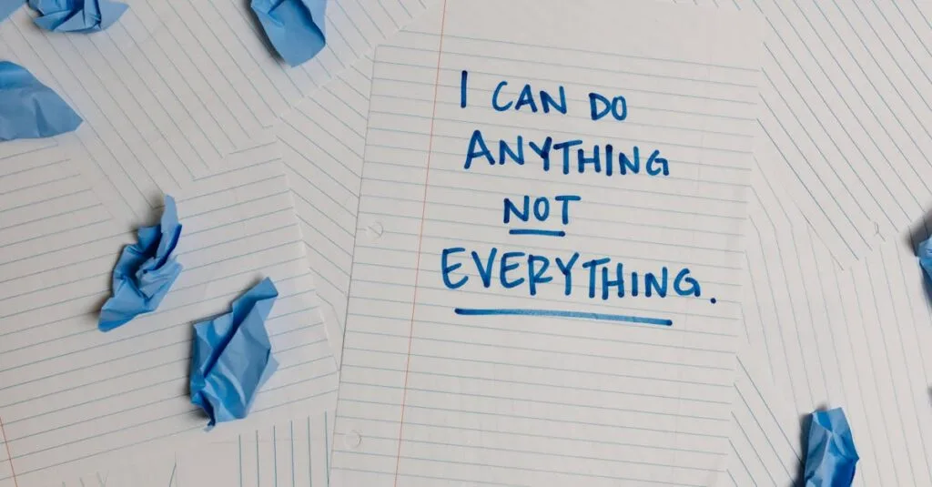 Inspirational note on paper with crumpled blue pages around, ideal for motivation concepts.