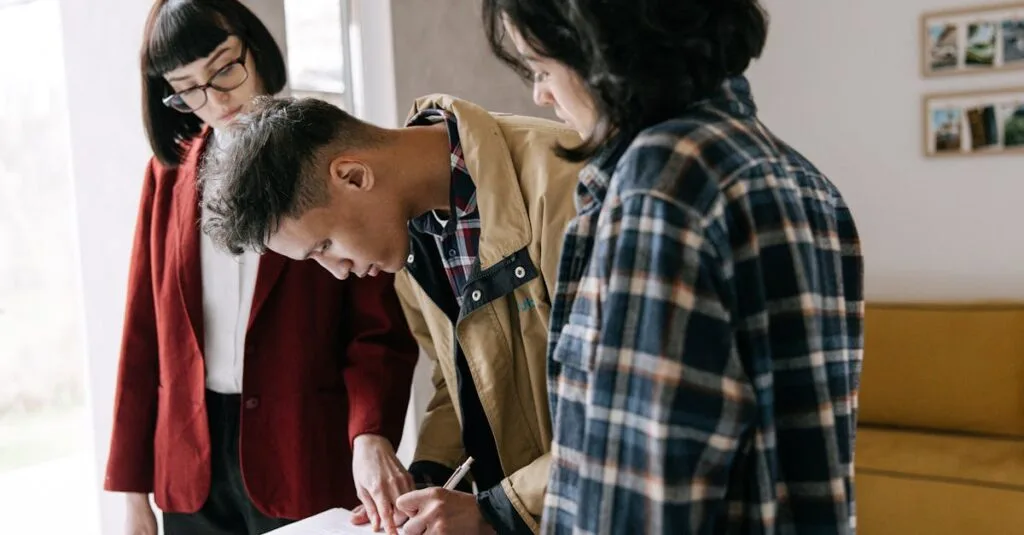 Young couple signing a real estate agreement with an agent indoors.
