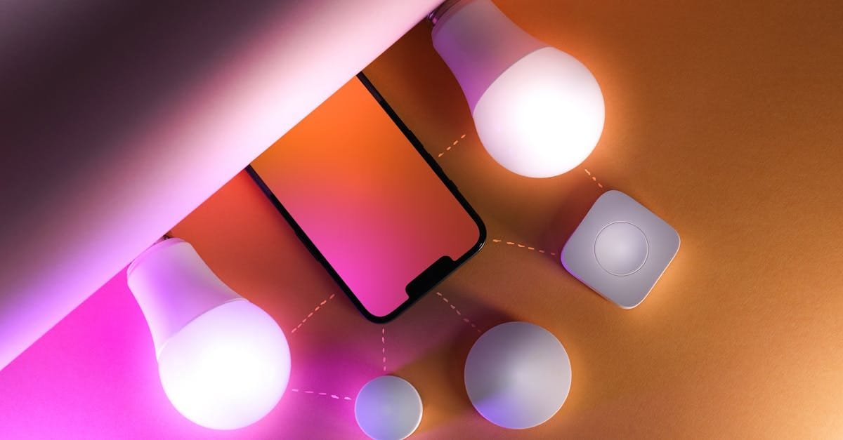 Creative arrangement of smart light bulbs and smartphone illustrating smart home technology.