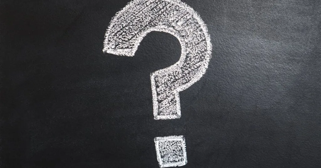 A conceptual image featuring a question mark drawn on a chalkboard, ideal for problem-solving contexts.