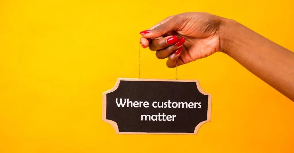 A close-up of a hand holding a sign stating Where customers matter against a bright yellow background.