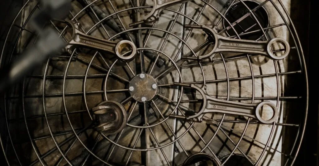 Top view of metal wrenches arranged on a grid in an industrial setting.