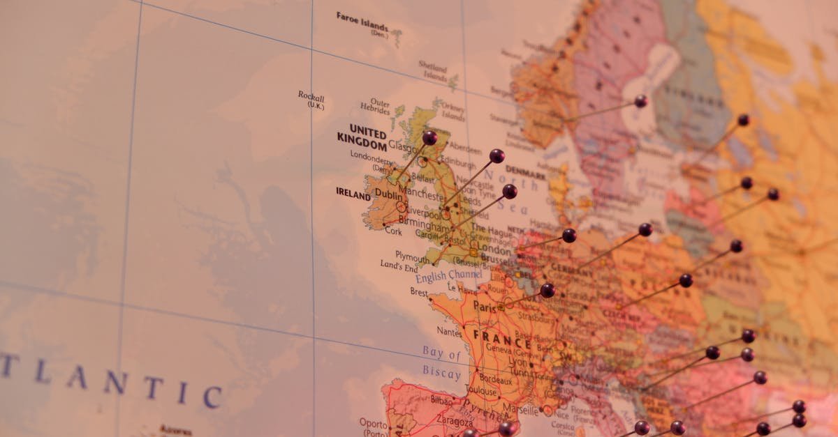 Close-up of a map with push pins marking countries in Europe, including Ireland and the UK.
