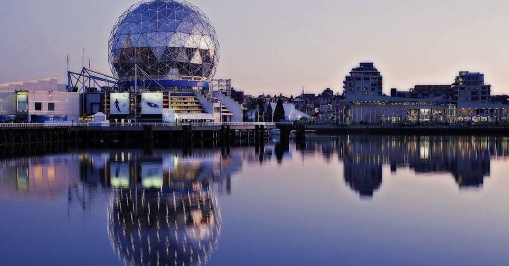 Stunning sunset reflection of Science World geodesic dome at Vancouver's False Creek.