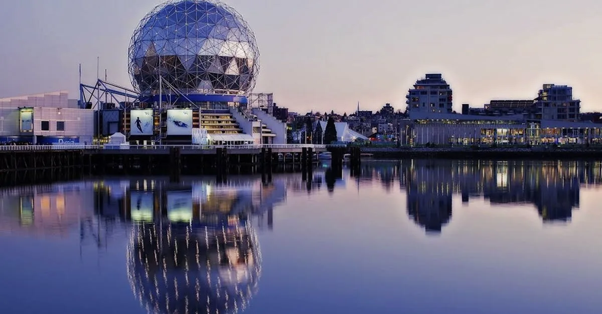 Stunning sunset reflection of Science World geodesic dome at Vancouver's False Creek.