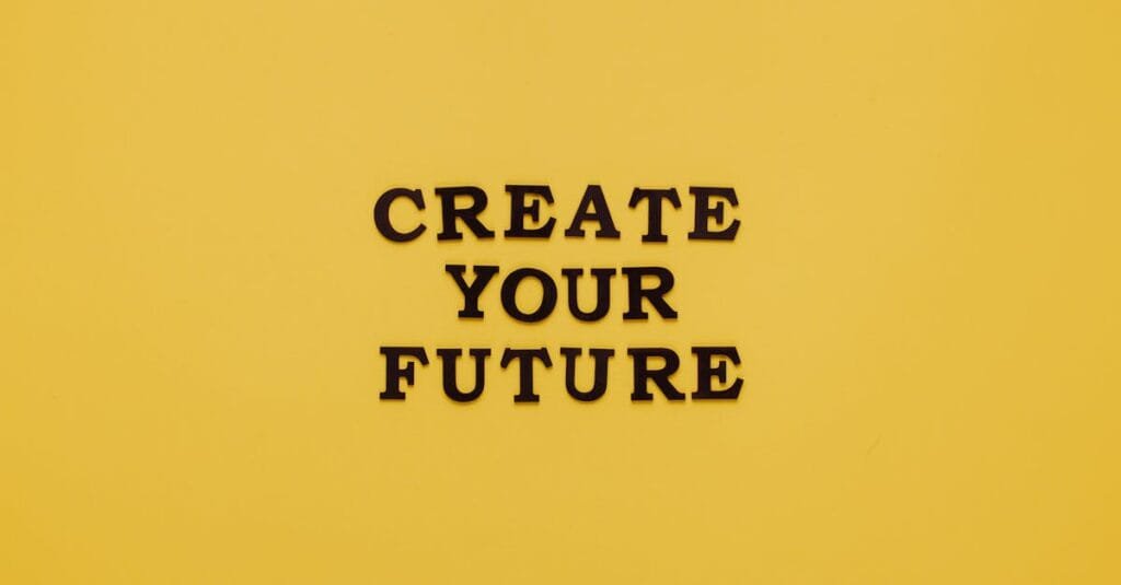 Bold text 'CREATE YOUR FUTURE' on minimalist yellow background. Inspiring design.